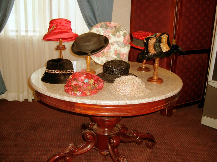 Display of several of Mrs. Combs beautiful hats.