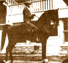 Mr. R. A. Long on his great saddle gelding, Redbuck.