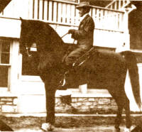 Mr. R. A. Long on his great saddle gelding, Redbuck